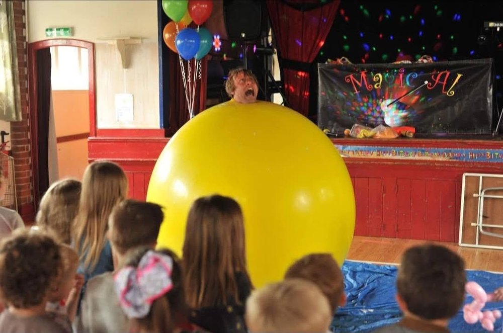 Children watching a Giant Balloon Show