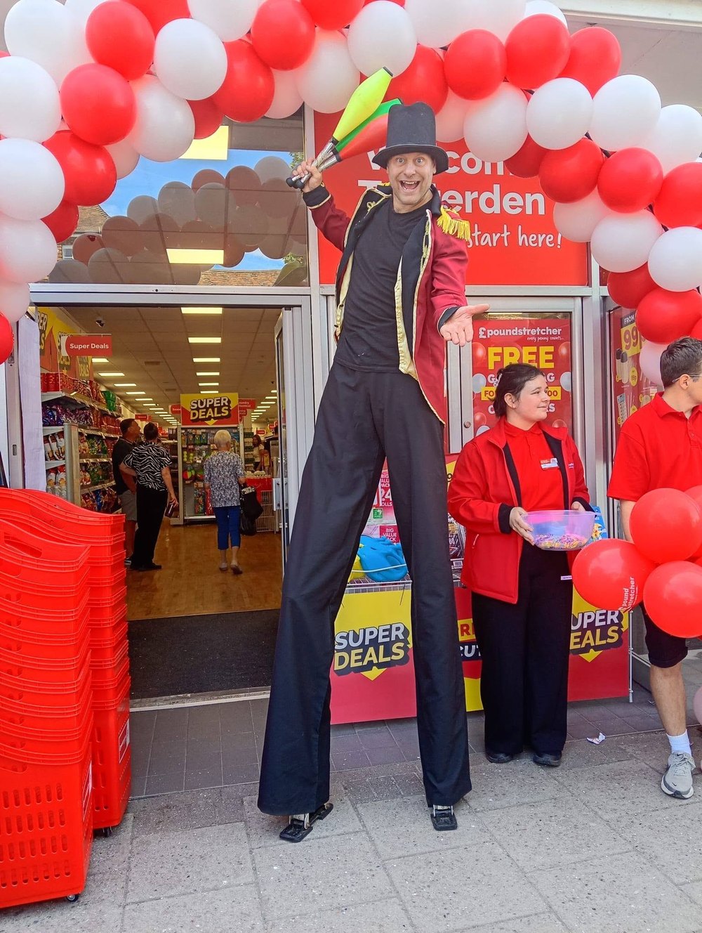 Store opening stilt walker